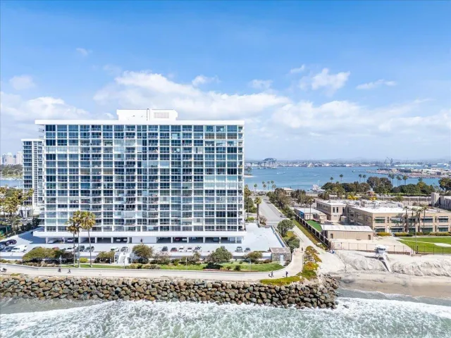 a view of a building with a yard