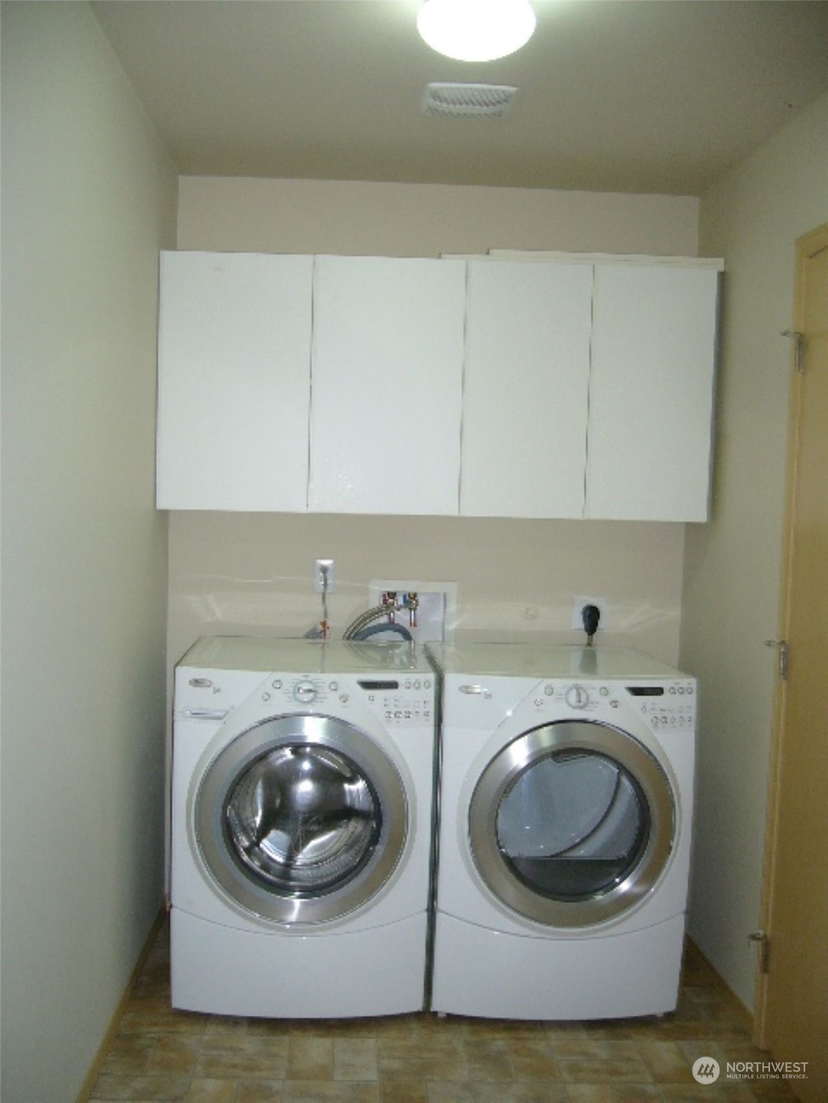 3602 154th Place Southeast Bothell, WA 98012 - Photo 11 of 22 a utility room with a sink dryer and washer
