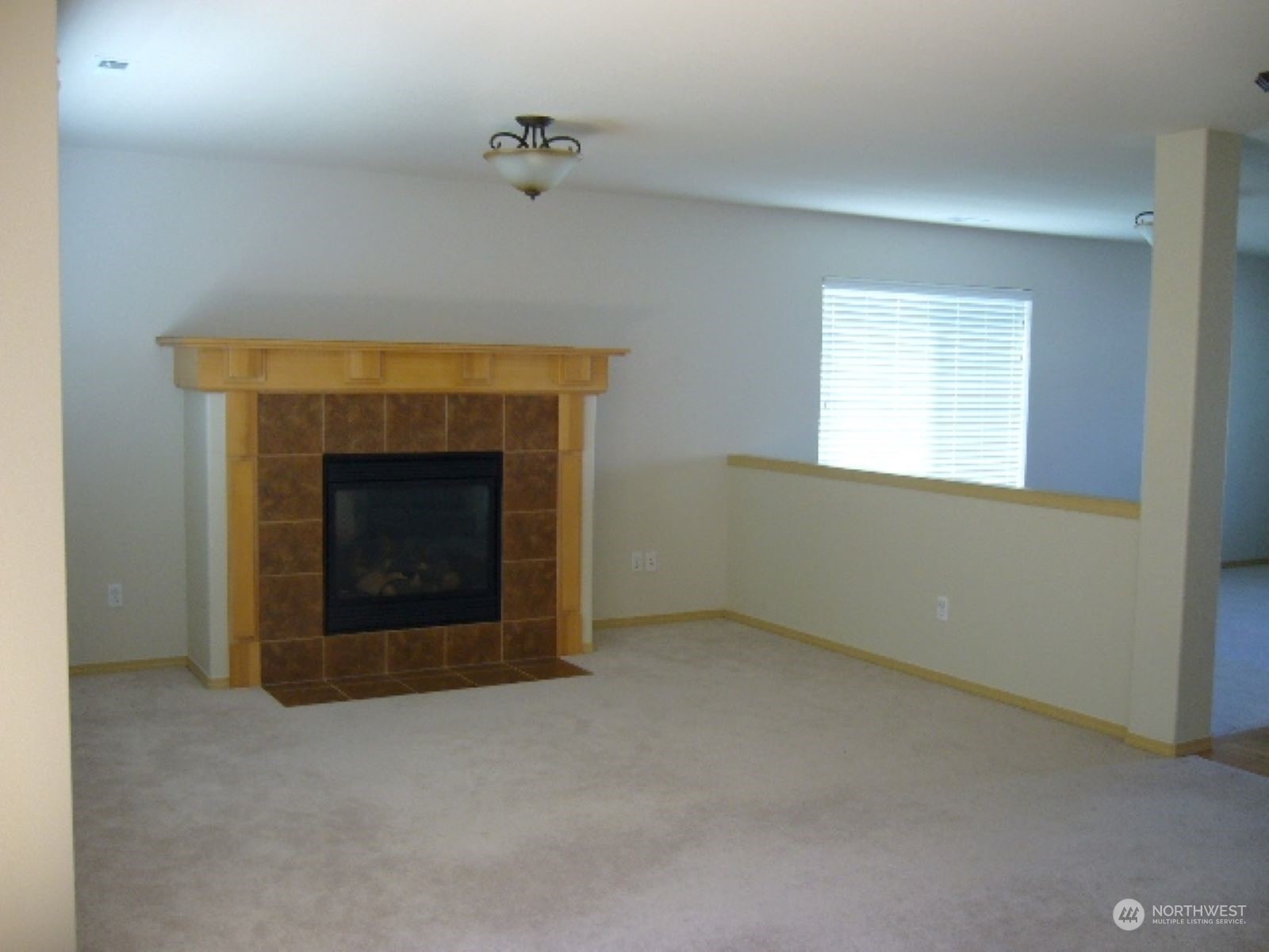 3602 154th Place Southeast Bothell, WA 98012 - Photo 17 of 22 a room with a fireplace