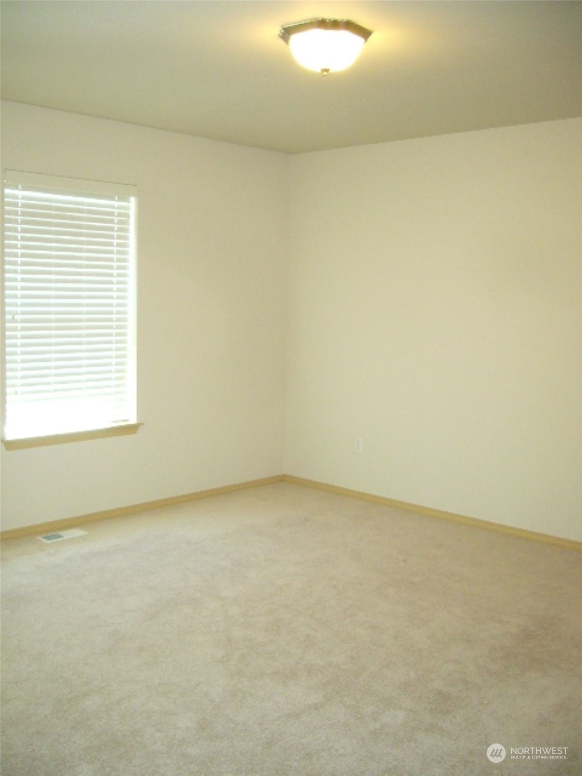 3602 154th Place Southeast Bothell, WA 98012 - Photo 19 of 22 an empty room with a window