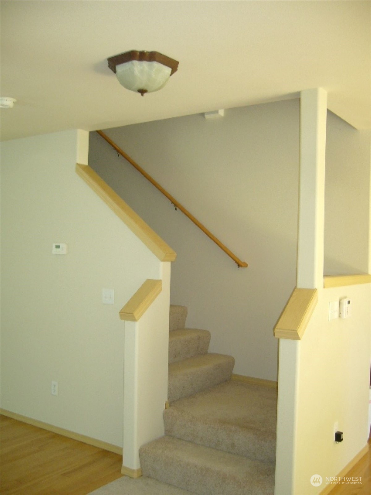 3602 154th Place Southeast Bothell, WA 98012 - Photo 20 of 22 a view of a room with racks on the wall