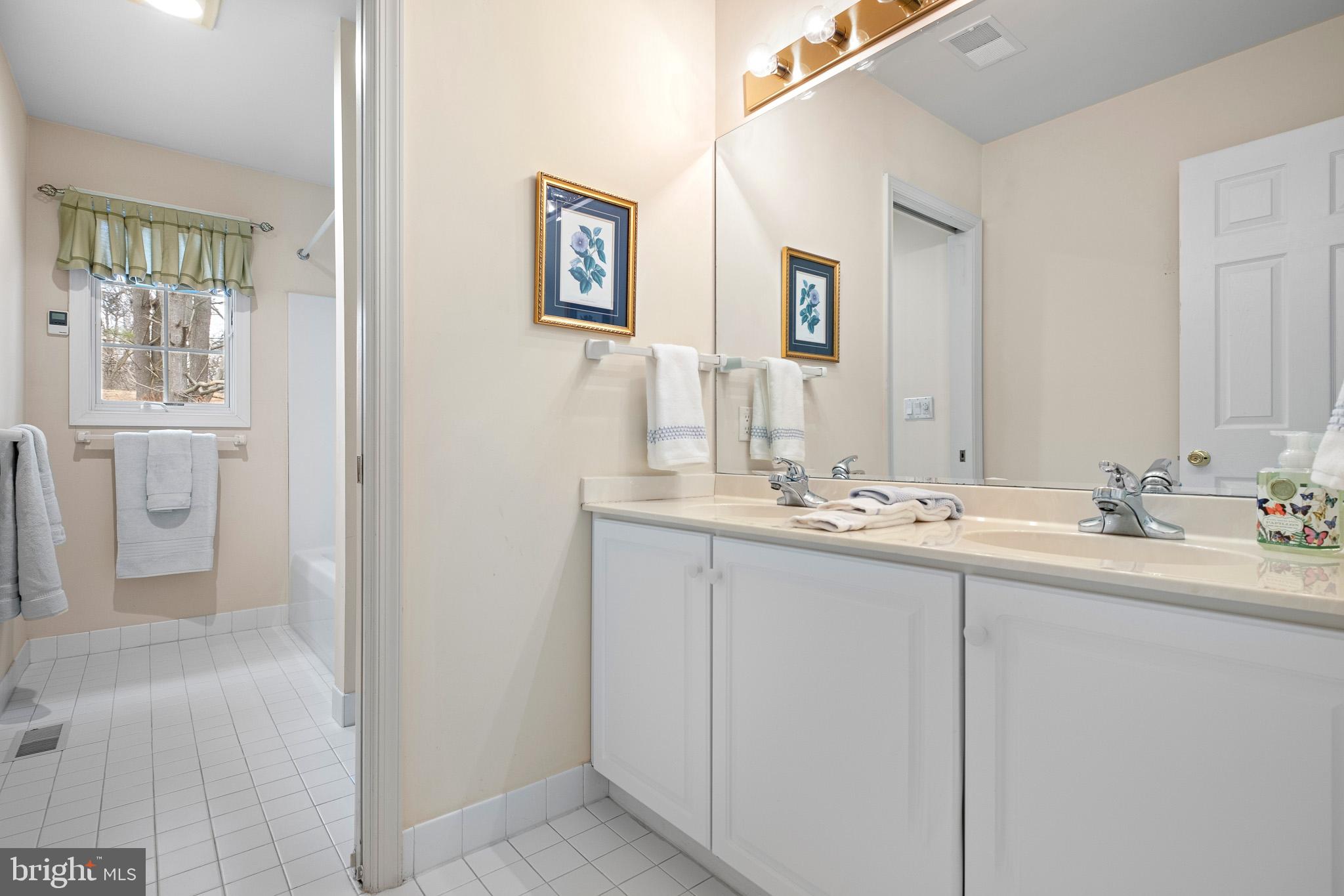 21 Ridings Way Chadds Ford, PA 19317 - Photo 24 of 34 Hall bath with double sinks