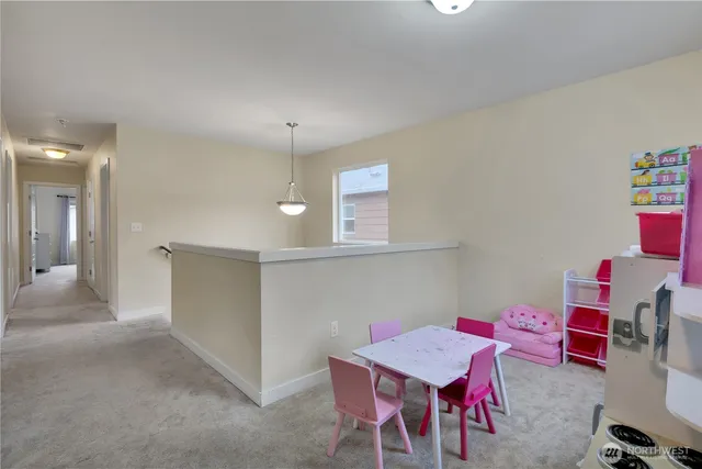 a room with furniture and a wooden floor