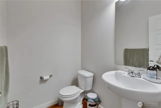 a bathroom with a sink and a toilet