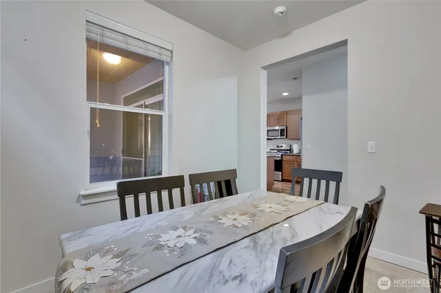 a view of a dining room with furniture