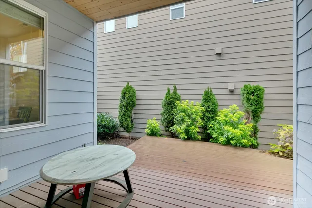 a view of a backyard and a chairs