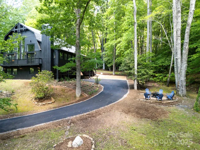 swimming pool view with a seating space
