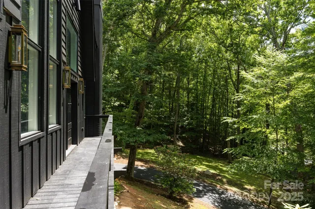 a view of living room with furniture and fireplace