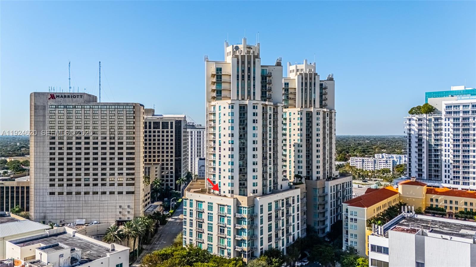 9055 Southwest 73rd Court, Unit 809 Miami, FL 33156 - Photo 2 of 47 a city view with tall buildings