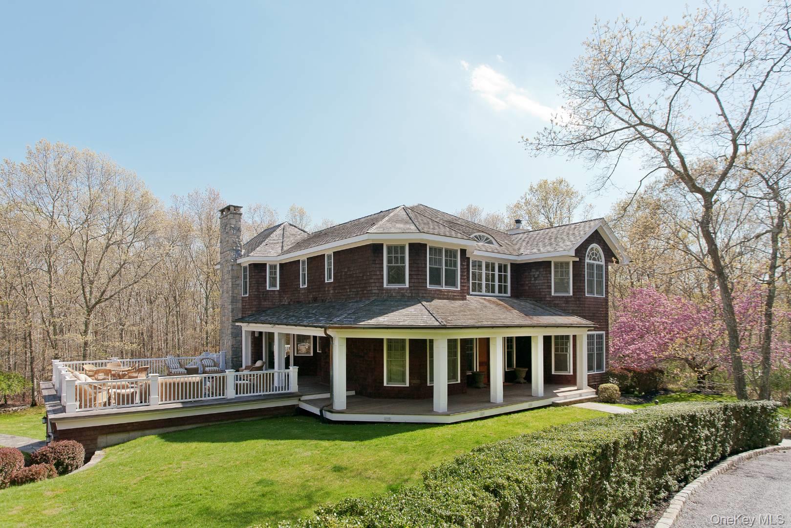 1477 Deerfield Road Water Mill, NY 11976 - Photo 1 of 17 Rear view of property with a chimney, a lawn, and a shingled roof