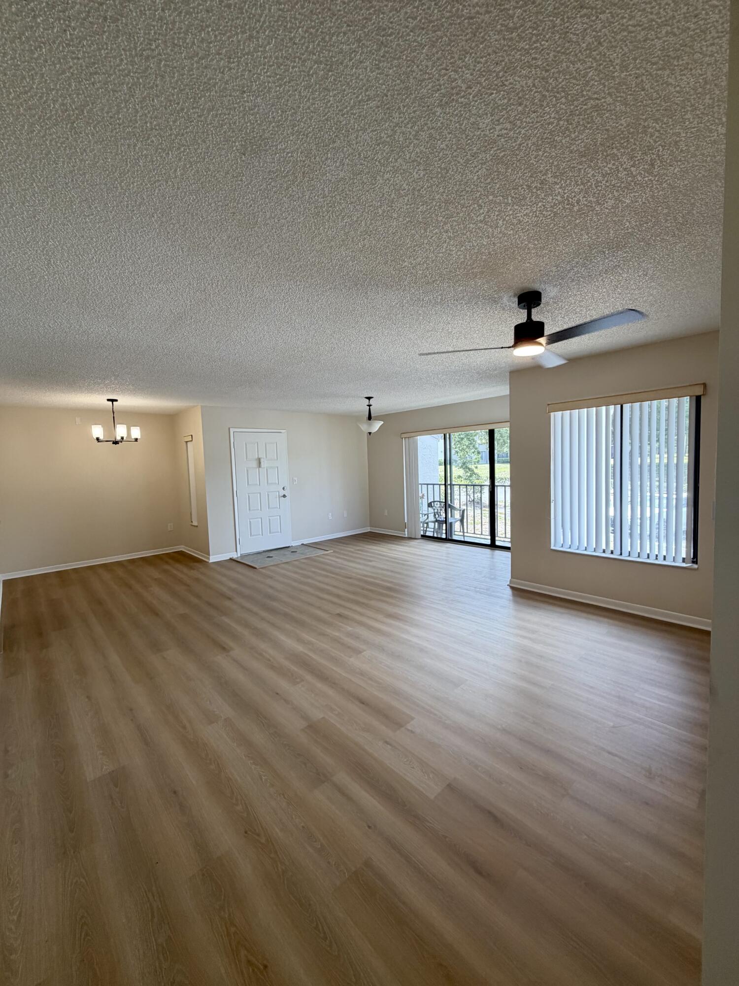 2575 Pine Ridge Way South, Unit A2 Palm Harbor, FL 34684 - Photo 2 of 10 2575 living room 3