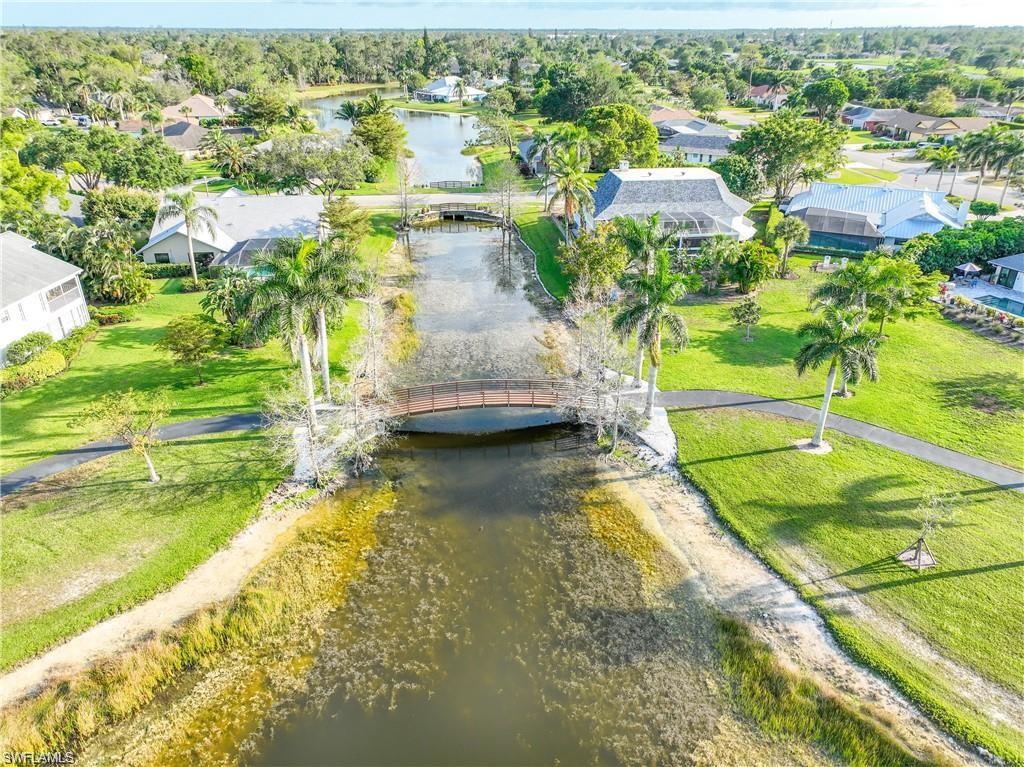 Santa Cruz Boulevard Naples, FL 34112 - Photo 4 of 8 an aerial view of residential houses with outdoor space