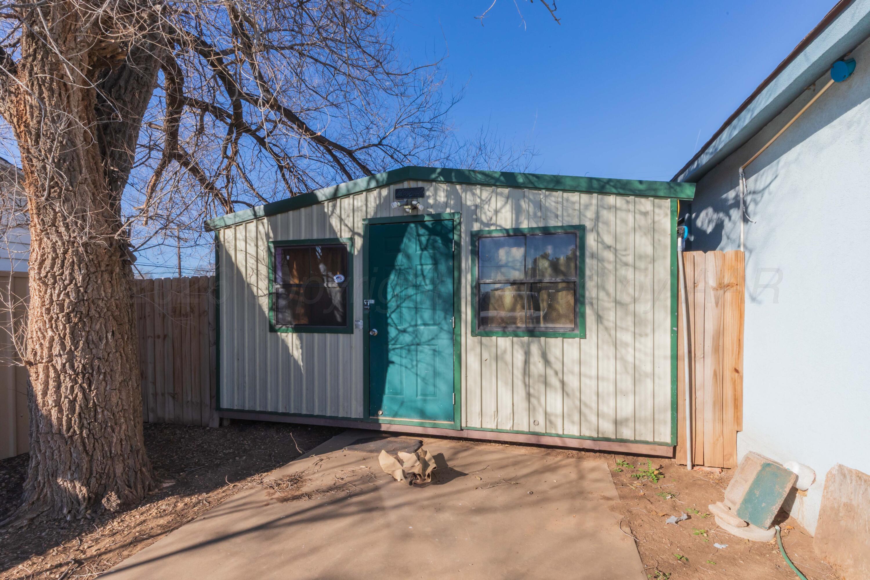 306 Browning Street Amarillo, TX 79104 - Photo 17 of 18 a backyard of a house