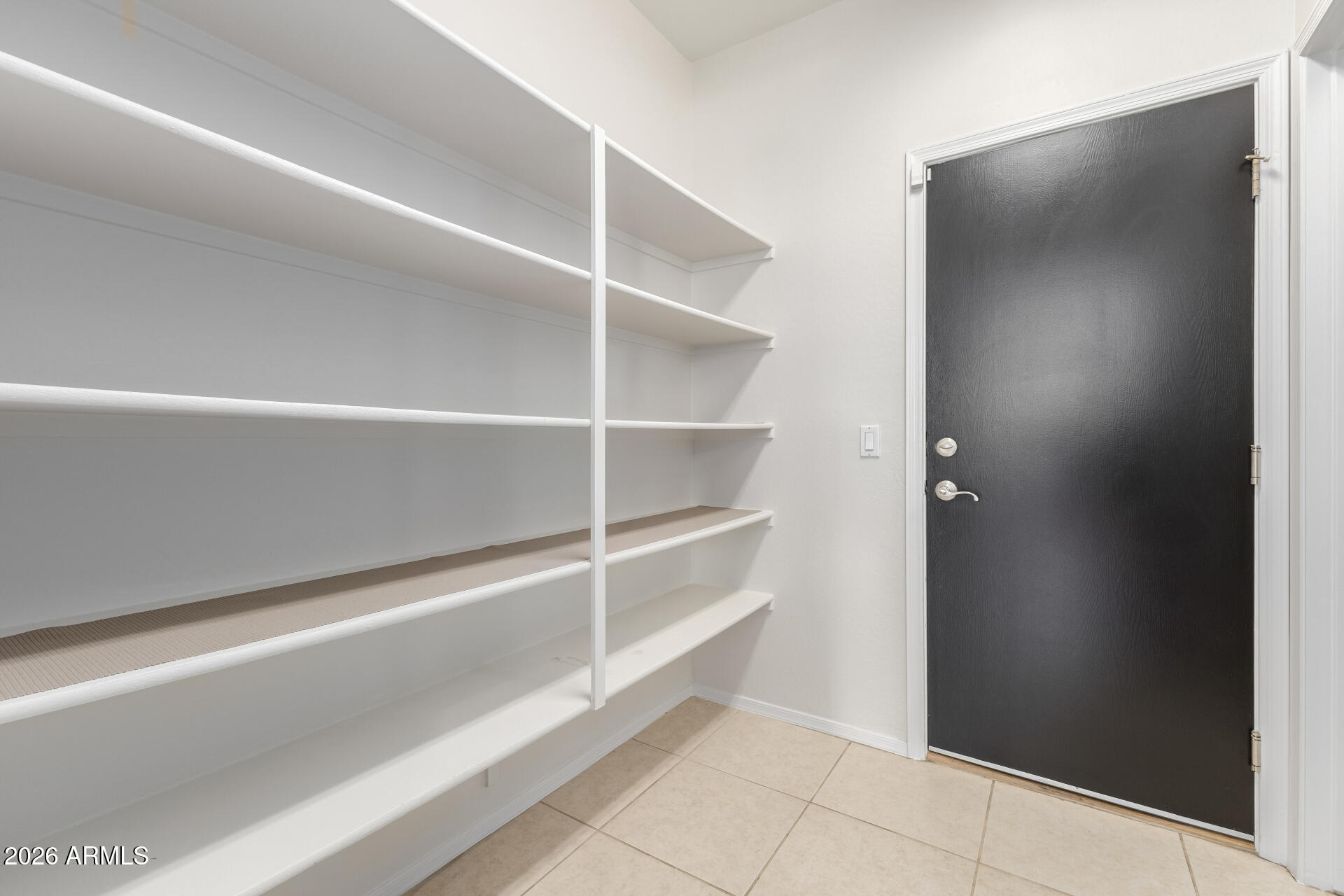 3535 East Terrace Avenue Gilbert, AZ 85234 - Photo 19 of 56 a view of an empty walk in closet