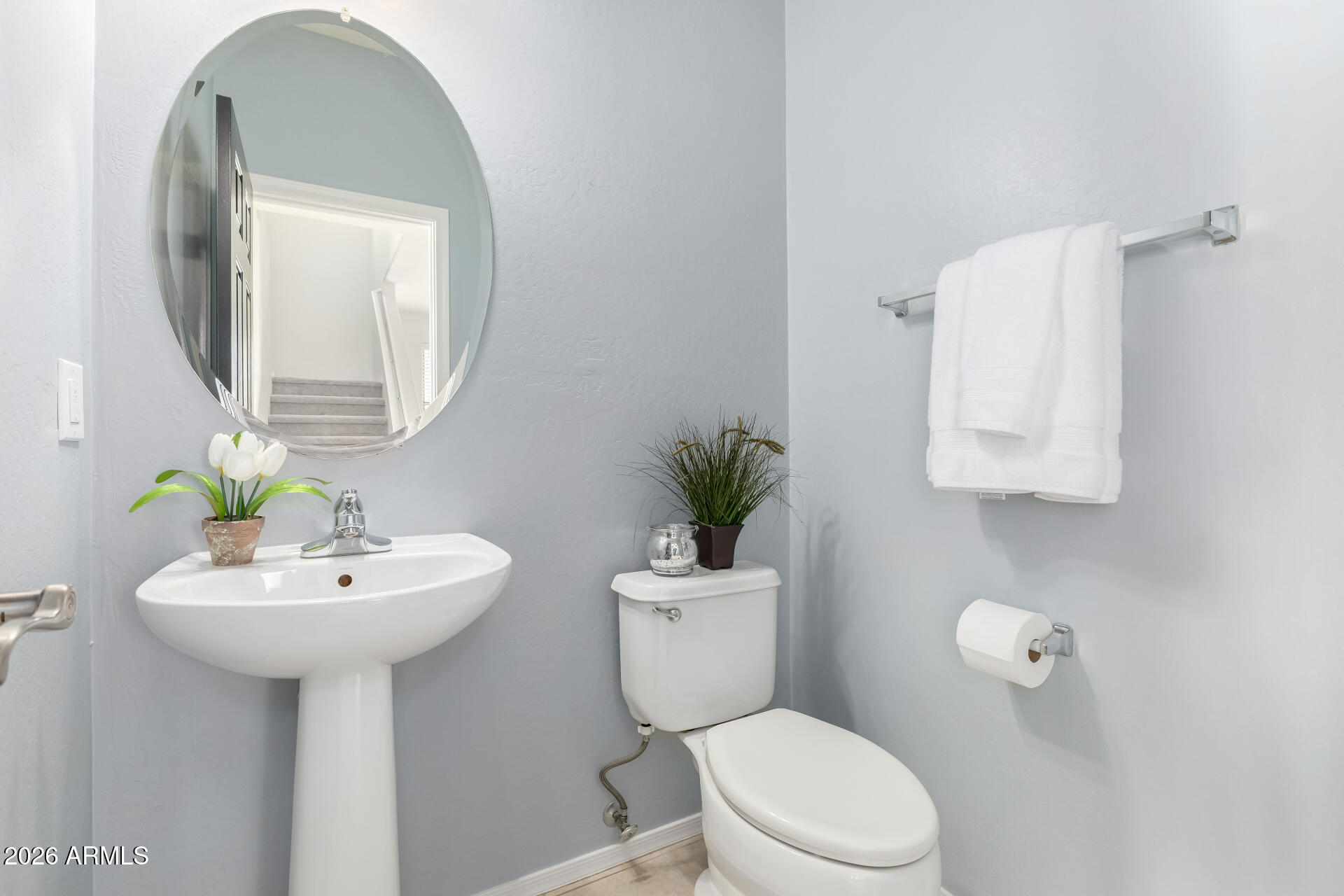 3535 East Terrace Avenue Gilbert, AZ 85234 - Photo 22 of 56 a bathroom with a sink toilet and a mirror