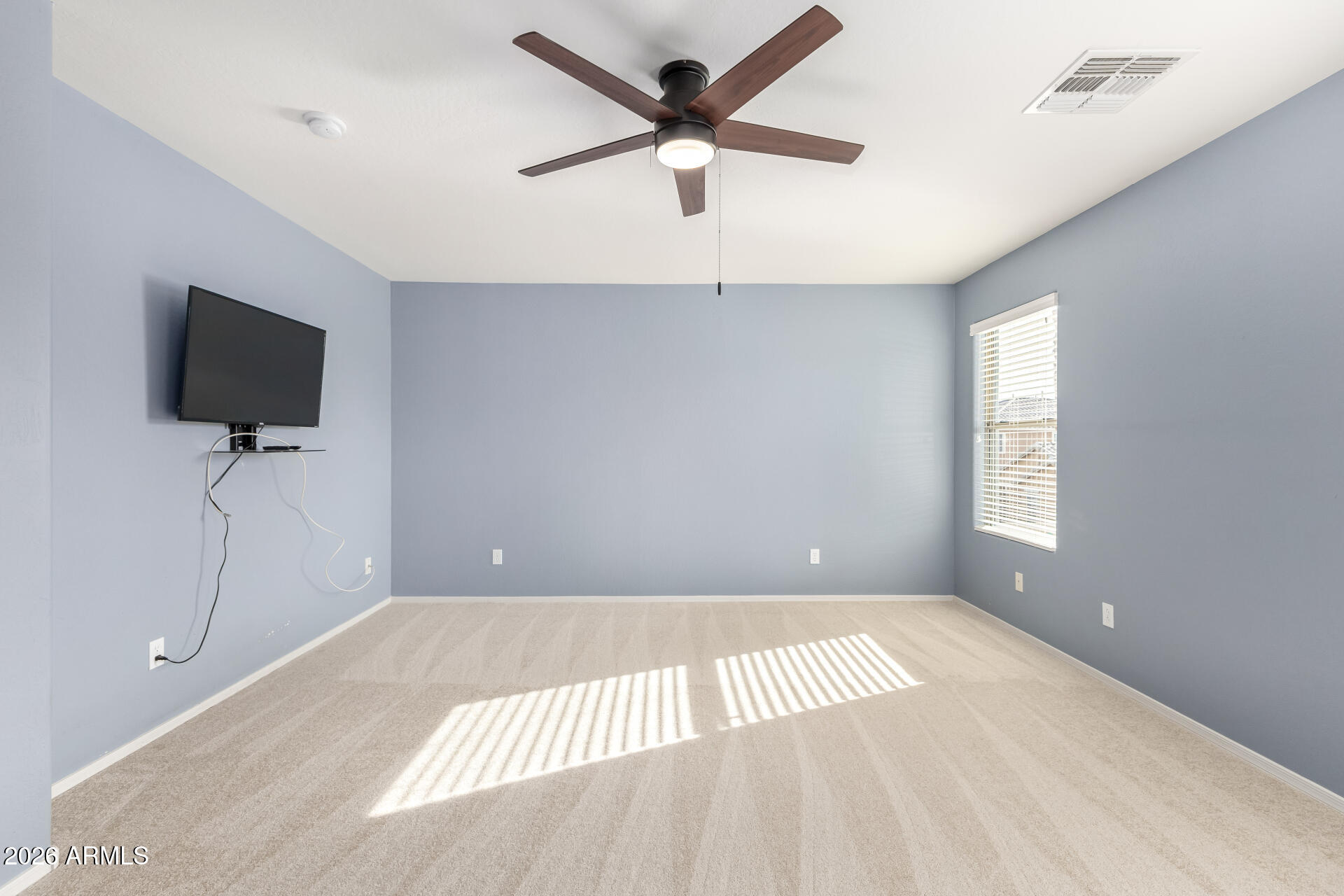 3535 East Terrace Avenue Gilbert, AZ 85234 - Photo 27 of 56 a view of a livingroom with a flat screen tv