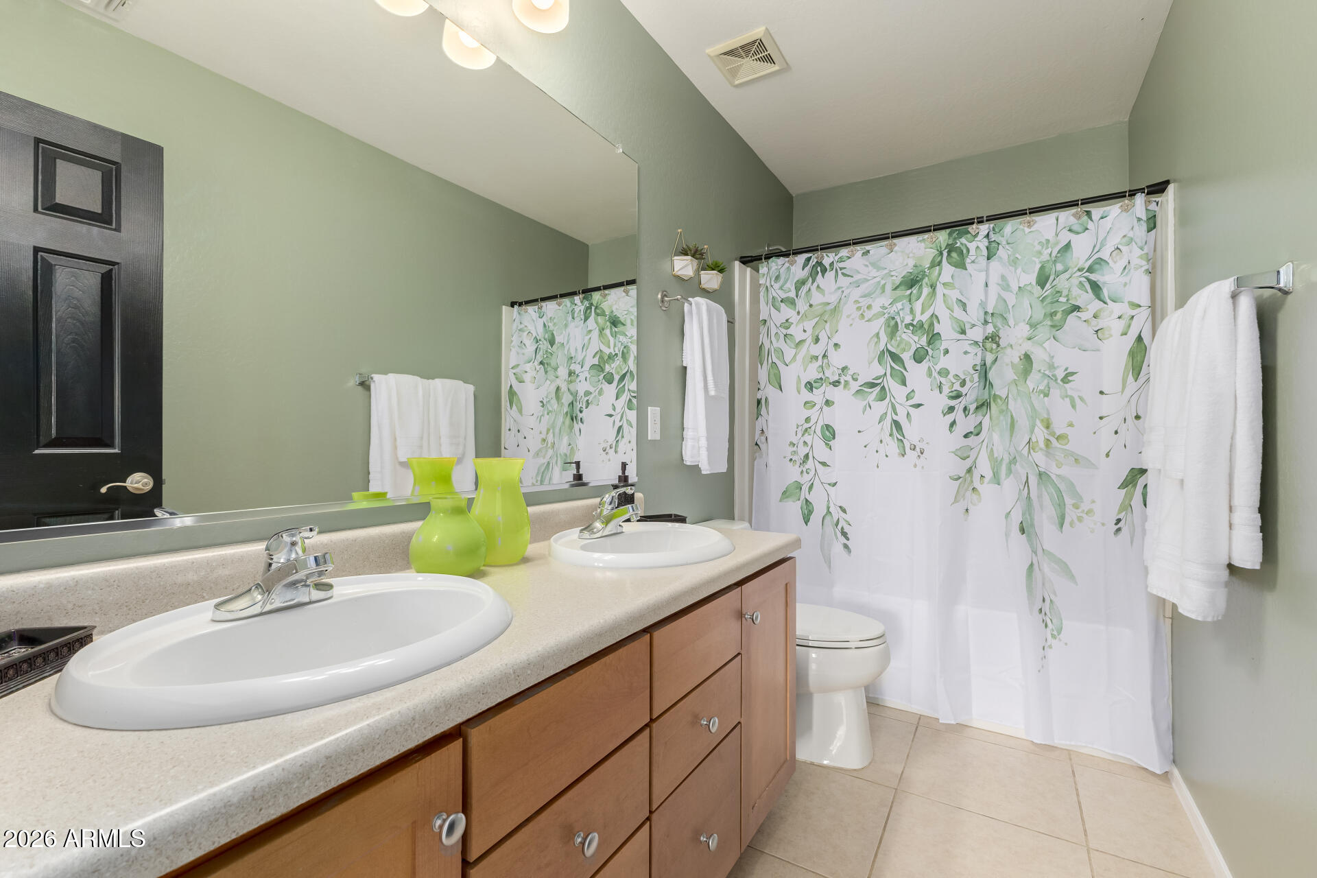 3535 East Terrace Avenue Gilbert, AZ 85234 - Photo 32 of 56 a bathroom with a sink and a mirror