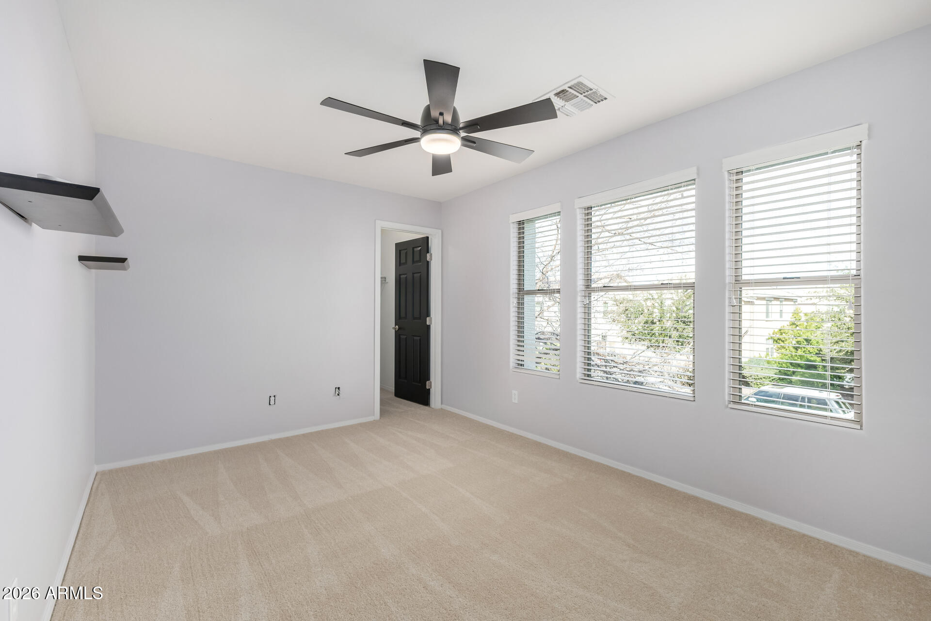 3535 East Terrace Avenue Gilbert, AZ 85234 - Photo 33 of 56 a view of an empty room with a window