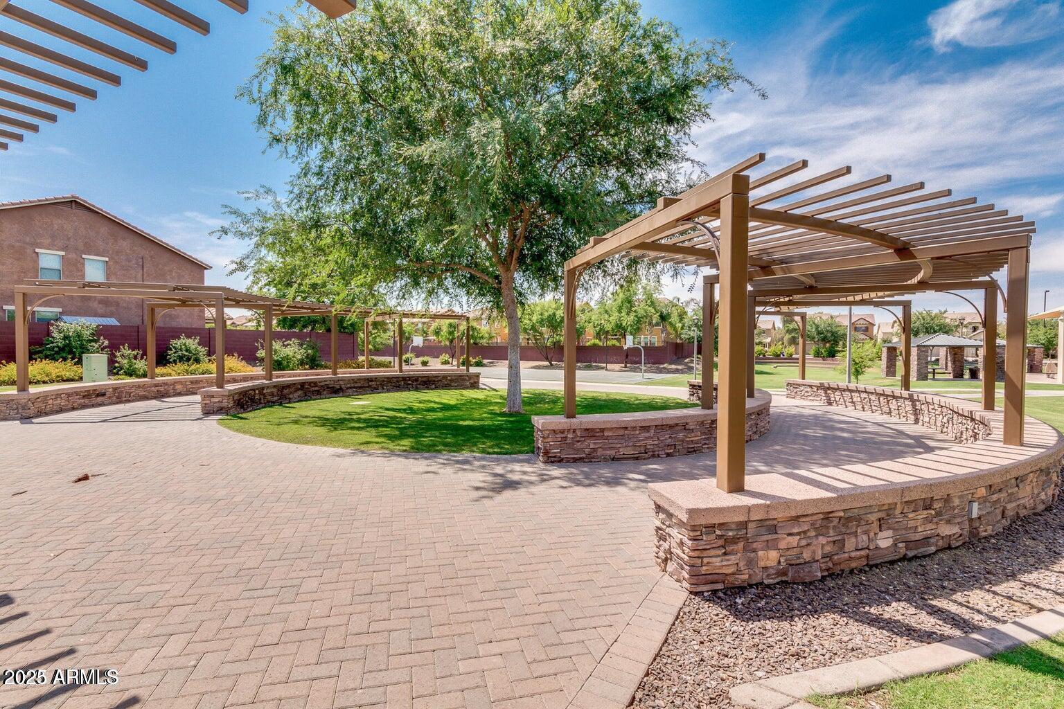 3535 East Terrace Avenue Gilbert, AZ 85234 - Photo 50 of 56 a house with garden in front of it