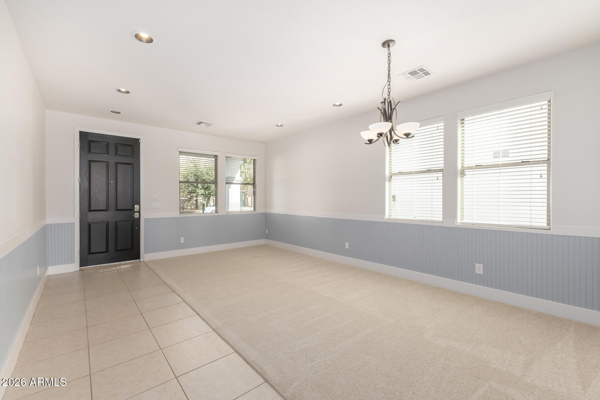 3535 East Terrace Avenue Gilbert, AZ 85234 - Photo 6 of 56 a view of an empty room with a window