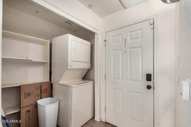 a view of a balcony with furniture