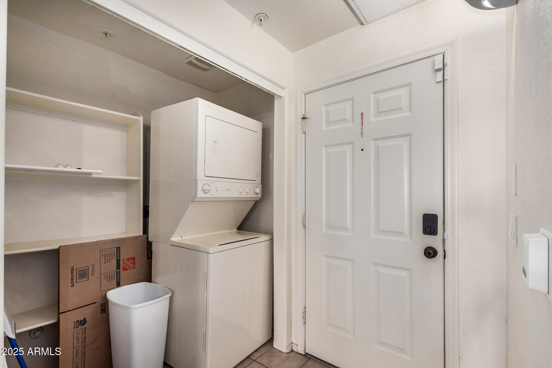 920 East Devonshire Avenue, Unit 2020 Phoenix, AZ 85014 - Photo 24 of 37 a bathroom with a sink and a washer dryer