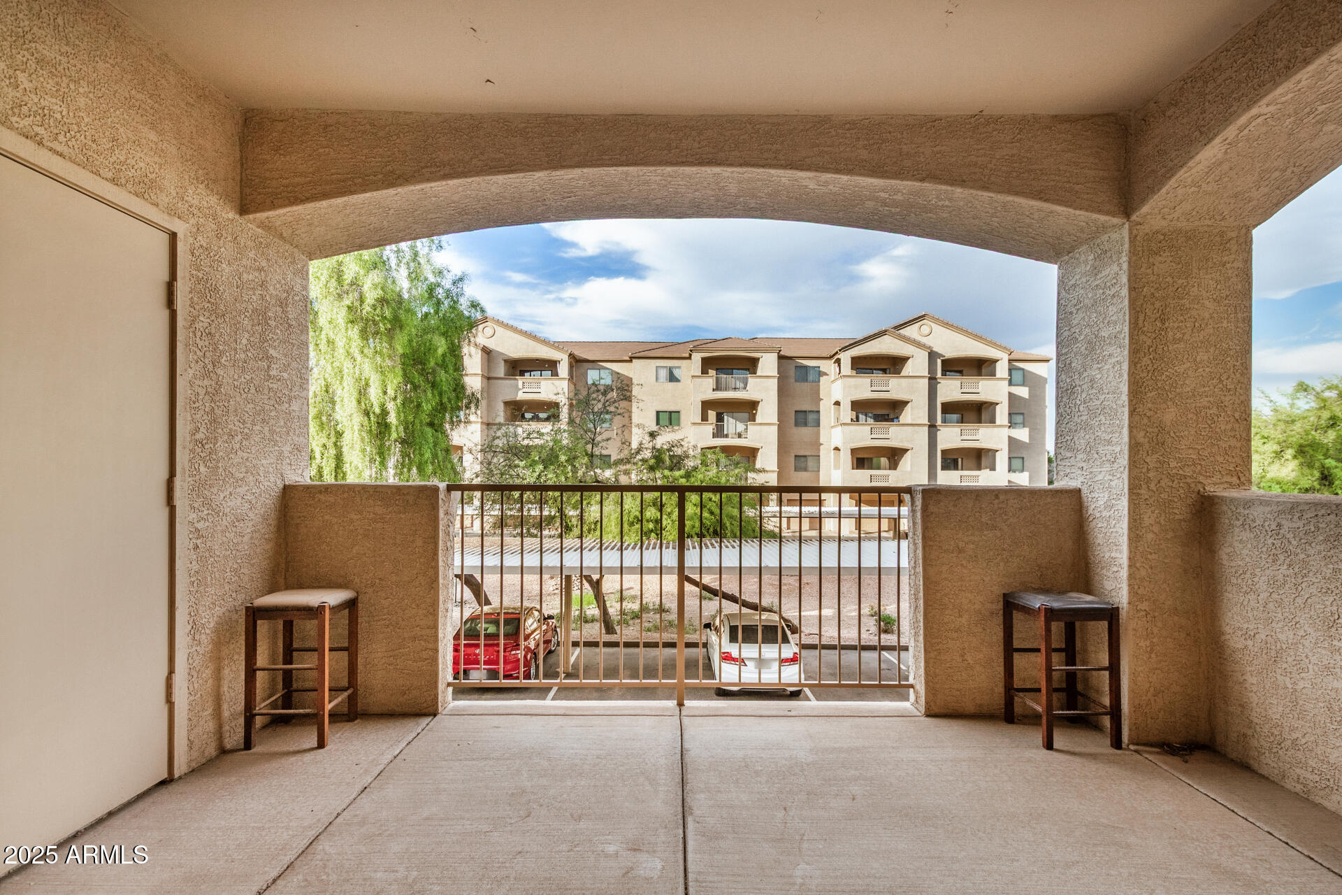 920 East Devonshire Avenue, Unit 2020 Phoenix, AZ 85014 - Photo 25 of 37 a view of a balcony with furniture
