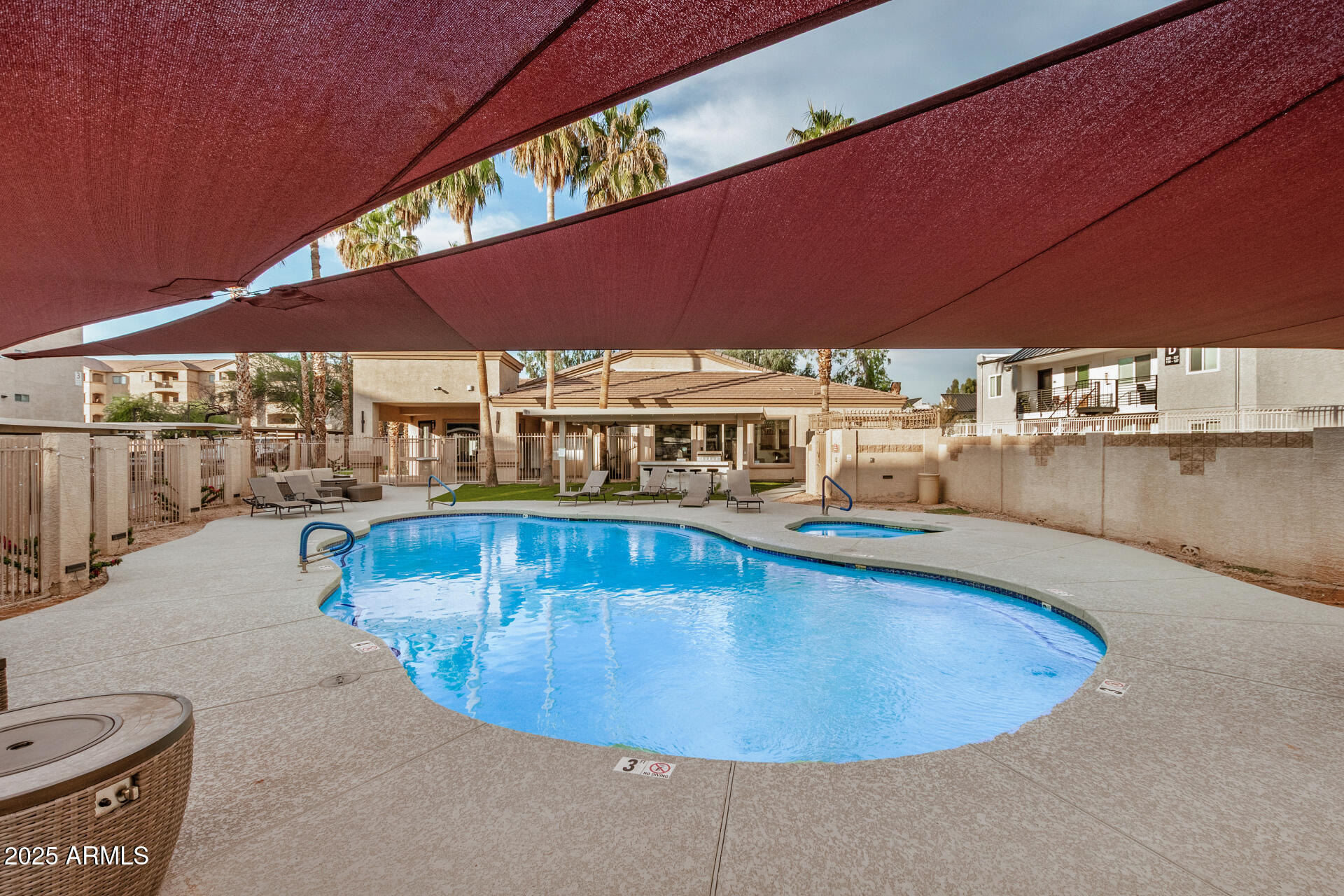 920 East Devonshire Avenue, Unit 2020 Phoenix, AZ 85014 - Photo 31 of 37 a view of a swimming pool with a patio