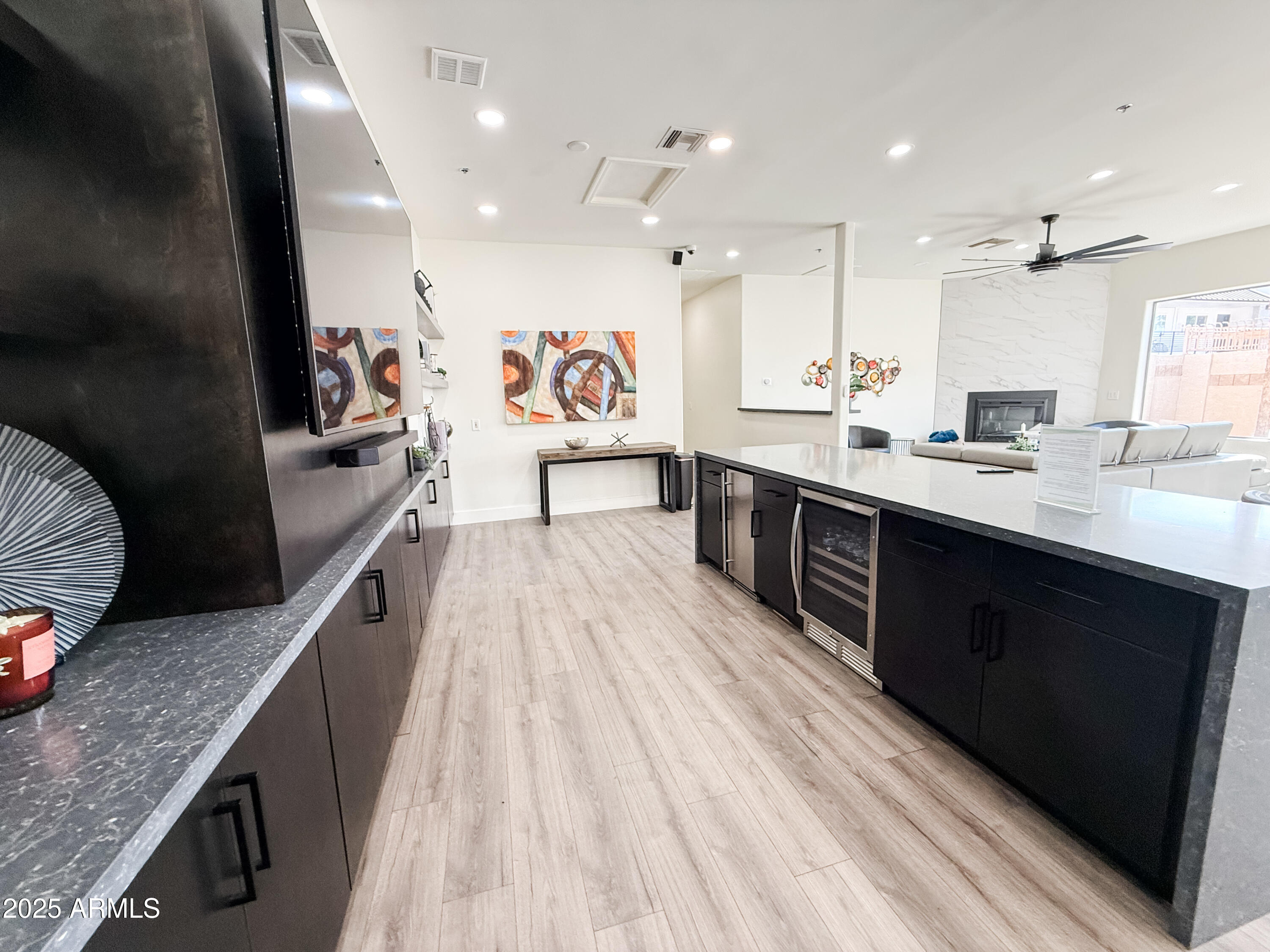 920 East Devonshire Avenue, Unit 2020 Phoenix, AZ 85014 - Photo 36 of 37 a large kitchen with stainless steel appliances kitchen island a large counter top a stove and a sink