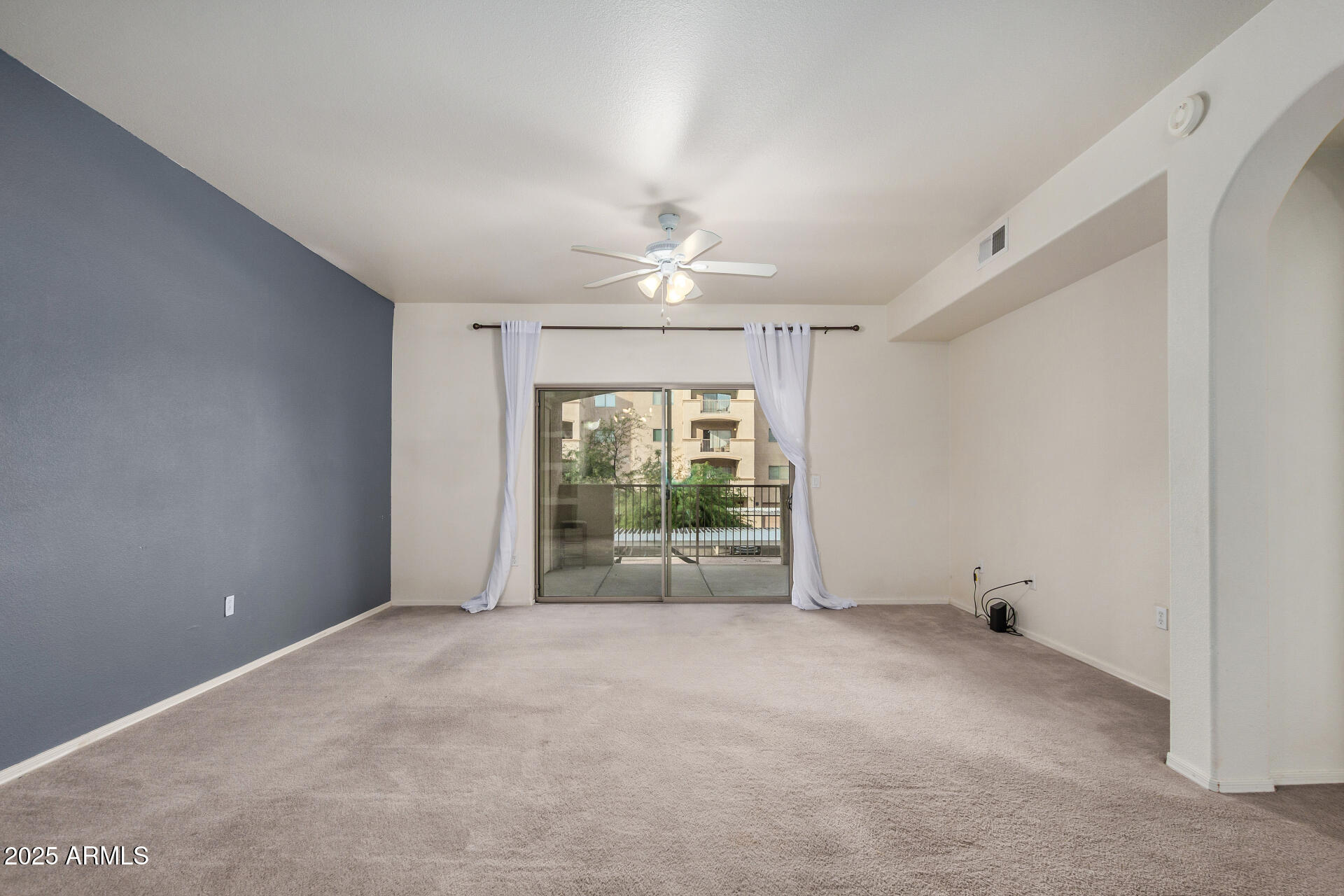920 East Devonshire Avenue, Unit 2020 Phoenix, AZ 85014 - Photo 6 of 37 a view of an empty room with a window