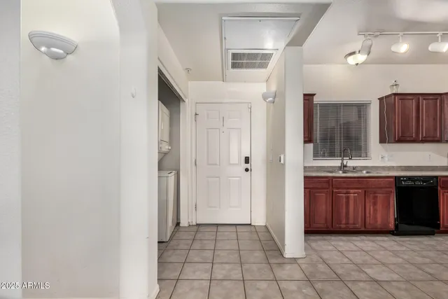 a large bathroom with a granite countertop sink a mirror and a vanity