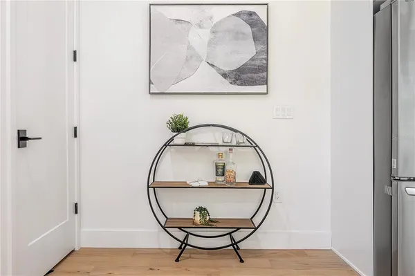 a view of a dining room with furniture and window