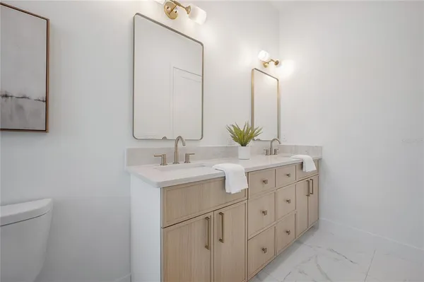 a view of a livingroom with wooden floor