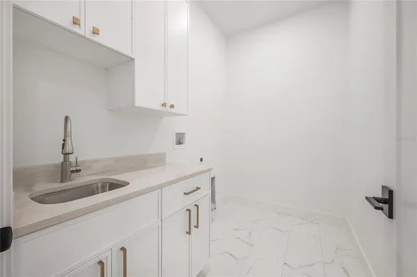 a view of a hallway with stairs