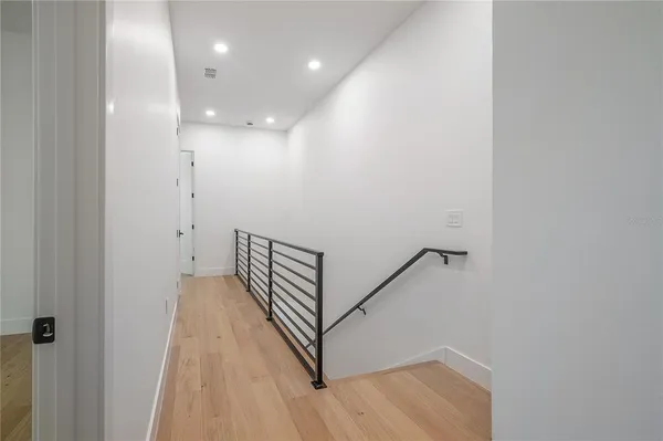 a view of a house with backyard and porch