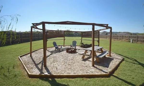 a view of a living room and a floor to ceiling window