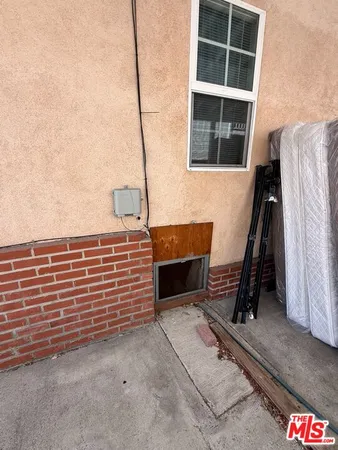 a view of an empty room with stairs