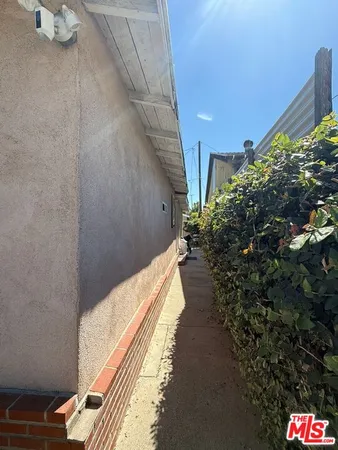 a view of a pathway with a bench