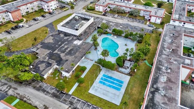 aerial view of a house with a garden