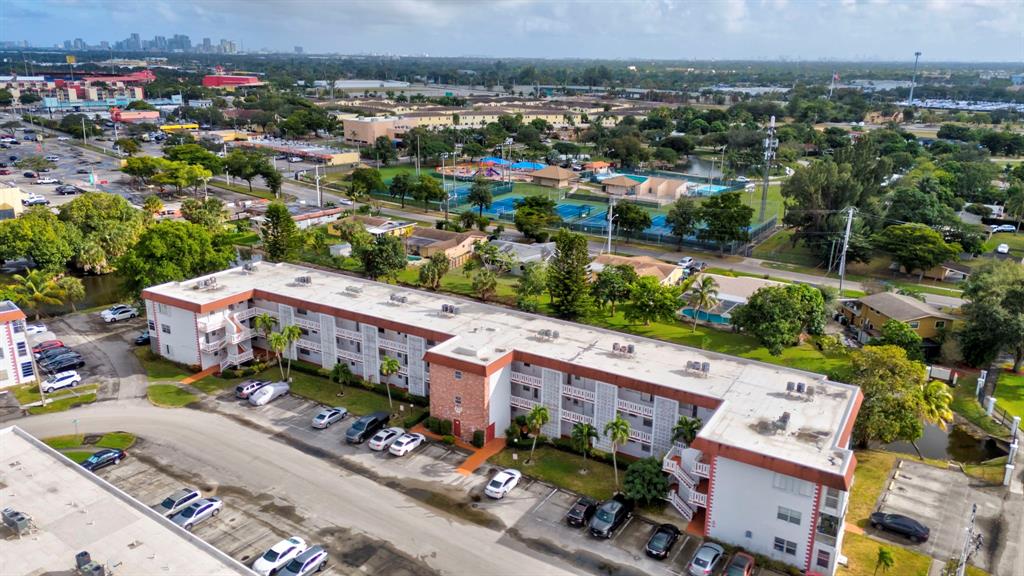 4310 Northwest 12th Court Lauderhill, FL 33313 - Photo 21 of 29 an aerial view of a house with a garden