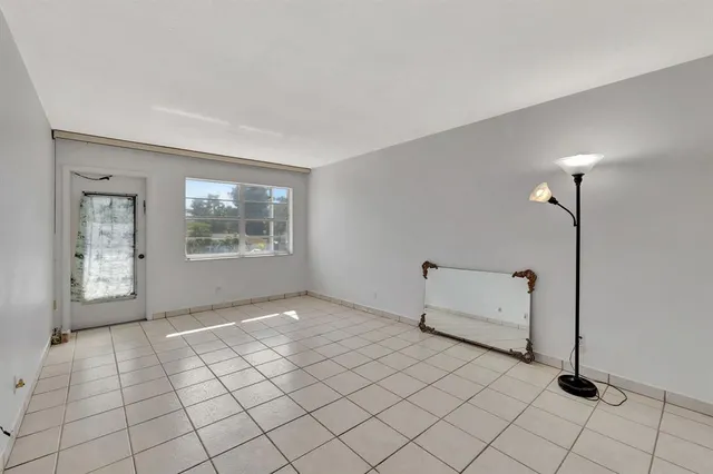 a view of an empty room with window