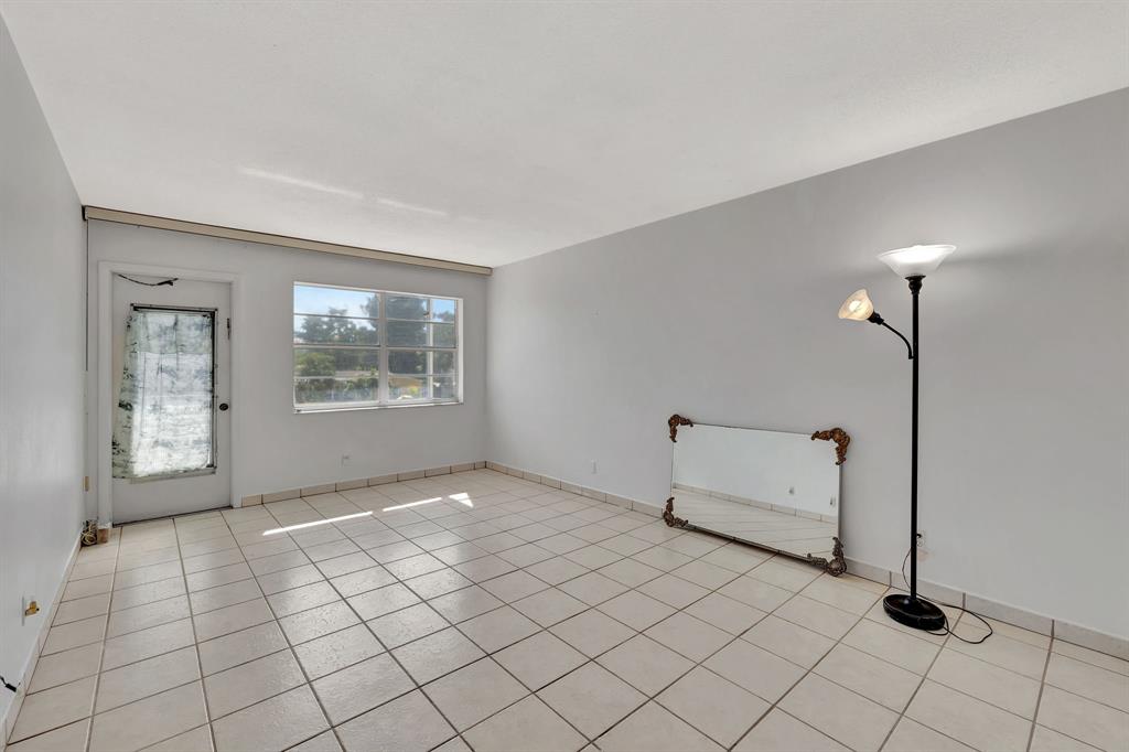 4310 Northwest 12th Court Lauderhill, FL 33313 - Photo 8 of 29 a view of an empty room with window