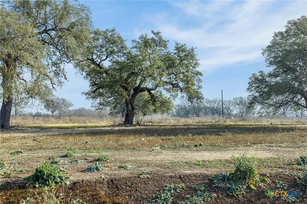 a view of a lake with outdoor space