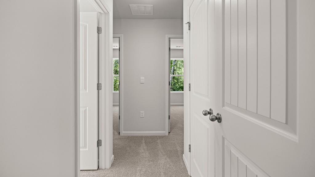 3277 Ryker Road Gainesville, GA 30507 - Photo 25 of 54 a view of a hallway with closet and bathroom