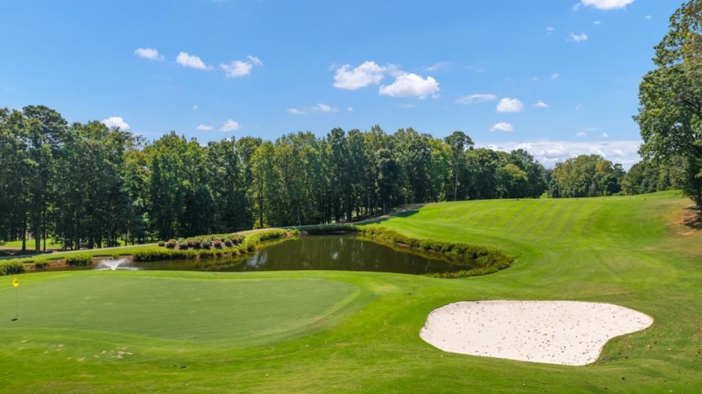 3277 Ryker Road Gainesville, GA 30507 - Photo 51 of 54 a view of a golf course with a house
