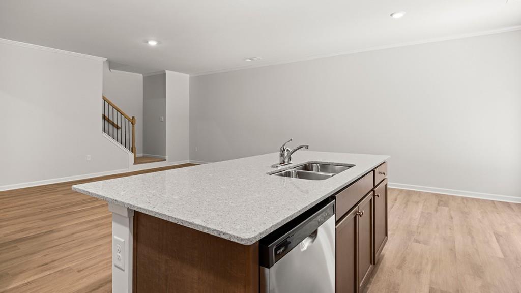 3277 Ryker Road Gainesville, GA 30507 - Photo 7 of 54 a kitchen with a stove a sink and a refrigerator