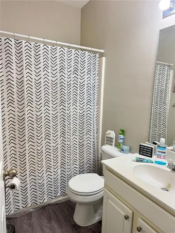 a bathroom with a sink and a toilet