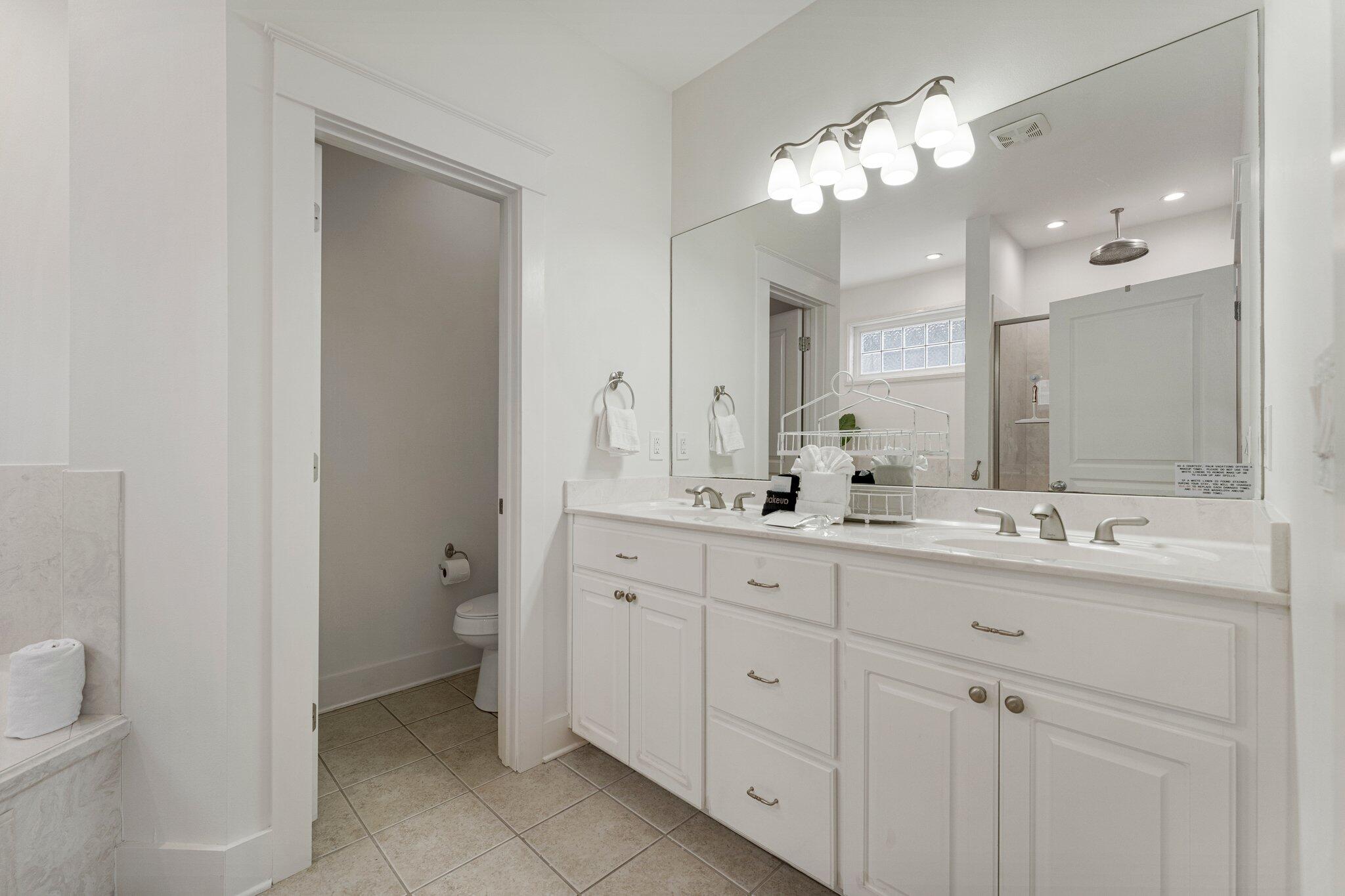 470 Beach Bike Way Inlet Beach, FL 32461 - Photo 18 of 48 a bathroom with a double vanity sink and a mirror