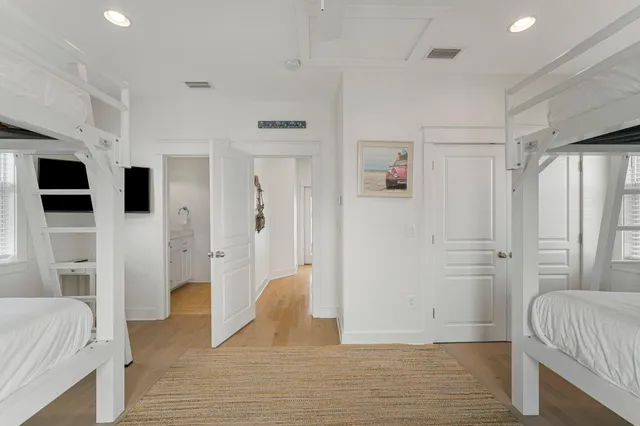a view of livingroom with hardwood floor and a ceiling fan