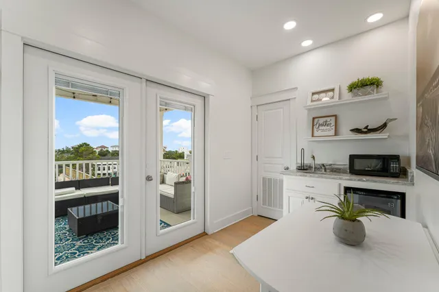 a kitchen with sink cabinets and window